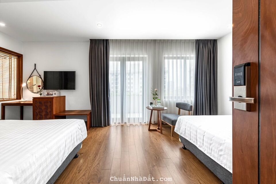 Bán Khách Sạn Phố Trần Thái Tông 150m2 x 9 tầng, MT 9m, Vị Trí Đẹp, Kinh Doanh Tuyệt Vời