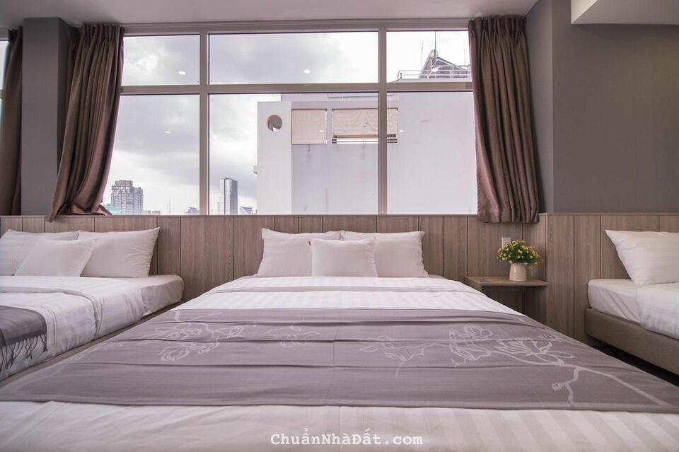 Bán Tòa Nhà KS 7 Tầng Mặt Tiền Cô Giang-Q.1(TN 7.300Usd)