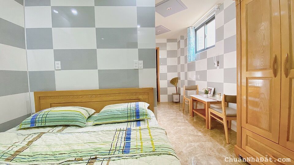 Bán nhà HXH Q1 Nguyễn Thị Minh Khai 51m2 gồm 10 CHVD cao cấp có thang máy 14 tỷ