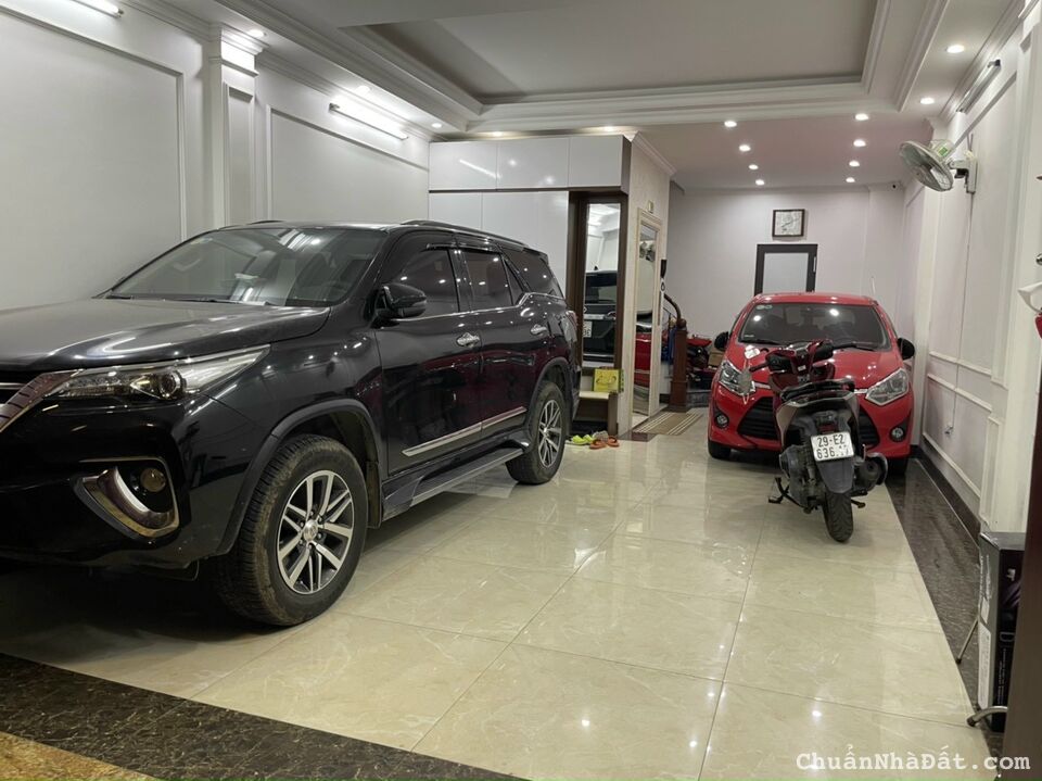 BÁN NHÀ PHỐ HÀO NAM 8 TẦNG 65M2 THANG MÁY - GARA 2 Ô TÔ - TT. ĐỐNG ĐA 