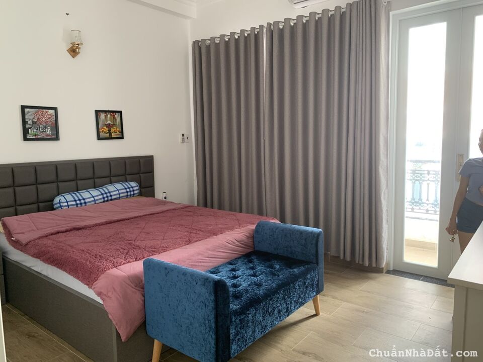 NHÀ KẾ CÔNG VIÊN GIA ĐỊNH TRƯỜNG ĐẠI HỌC TÀI CHÍNH MARKETING