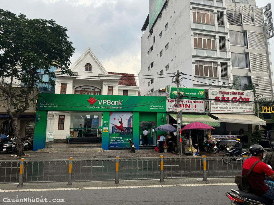 Bán Nhà Mặt Tiền 107 Nguyễn Thị Thập, Phường Tân Phú, Quận 7. DT: 11,8 x 15,6m - 2 Tầng.