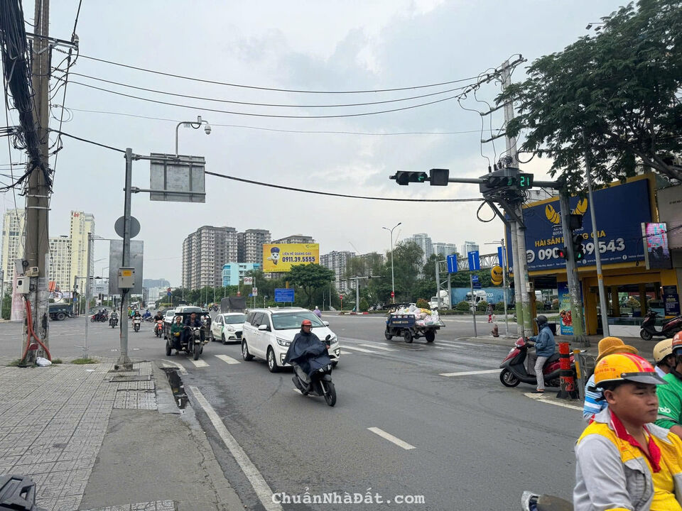 Bán Nhà Mặt Tiền 107 Nguyễn Thị Thập, Phường Tân Phú, Quận 7. DT: 11,8 x 15,6m - 2 Tầng.