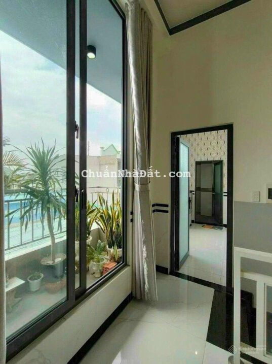 Nhà 2 lầu MT Bình Nhâm 63. DT 5.6x20m