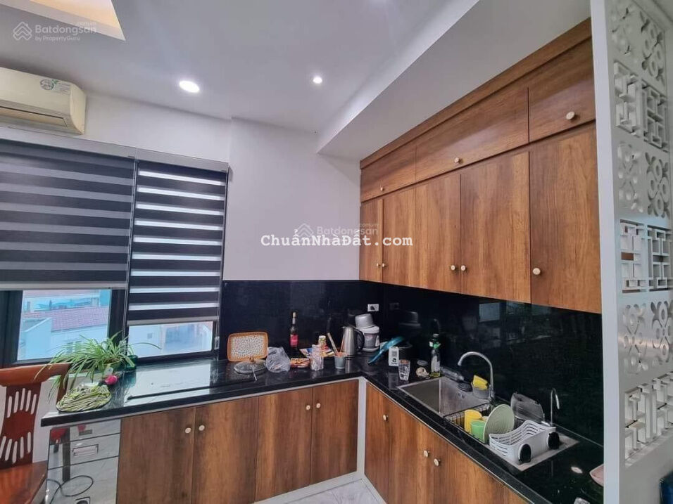 Bán nhà mặt hồ Hoàng Cầu-Mặt phố Mai Anh Tuấn -7 tầng thang máy doanh thu 40tr/th-DT:55m-MT:4m-9.9t