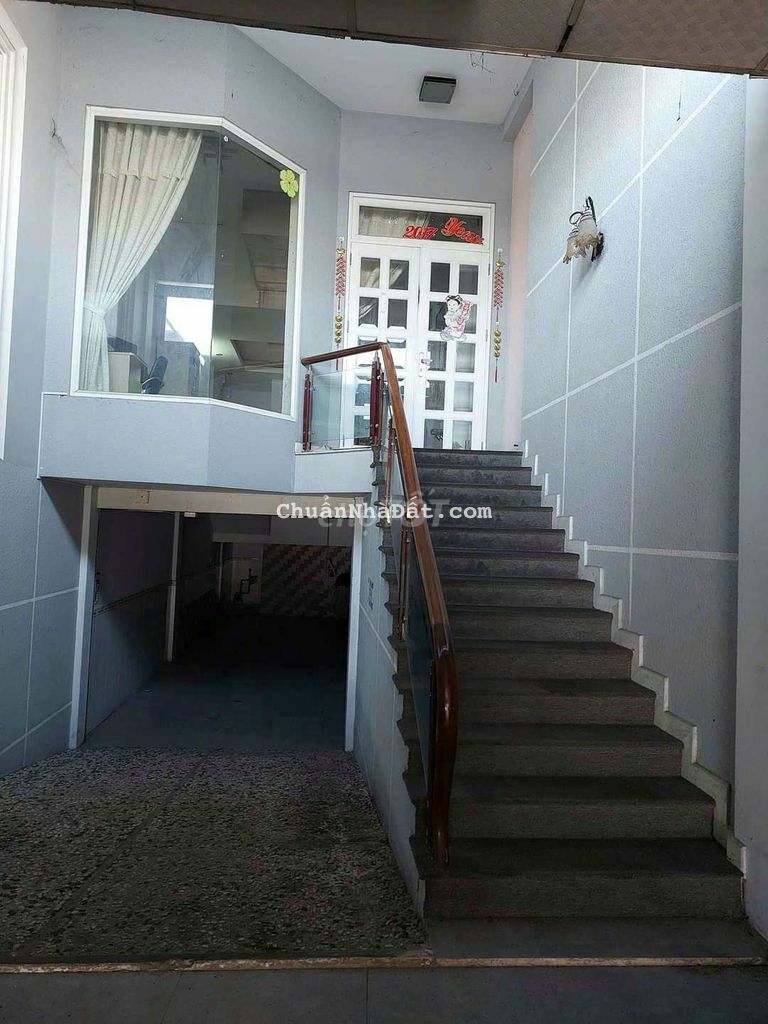 Bán nhà măt tiền QLô50..4lâu