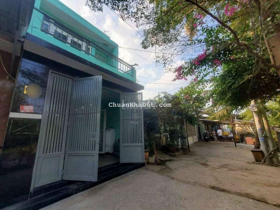 Bán gấp nhà lầu 60m2 sổ hồng riêng ấp5 xã phong phú đường ql50