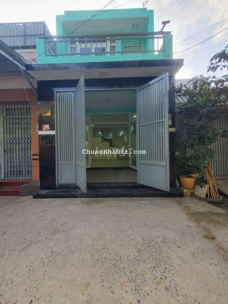 Bán gấp nhà lầu 60m2 sổ hồng riêng ấp5 xã phong phú đường ql50