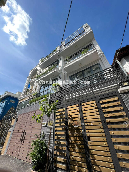 Nhà mới cứng 100% ở ngay hẻm xe hơi 1 trục ngay Nguyễn Văn Đậu, 60m2, sát mặt tiền, giá rẻ