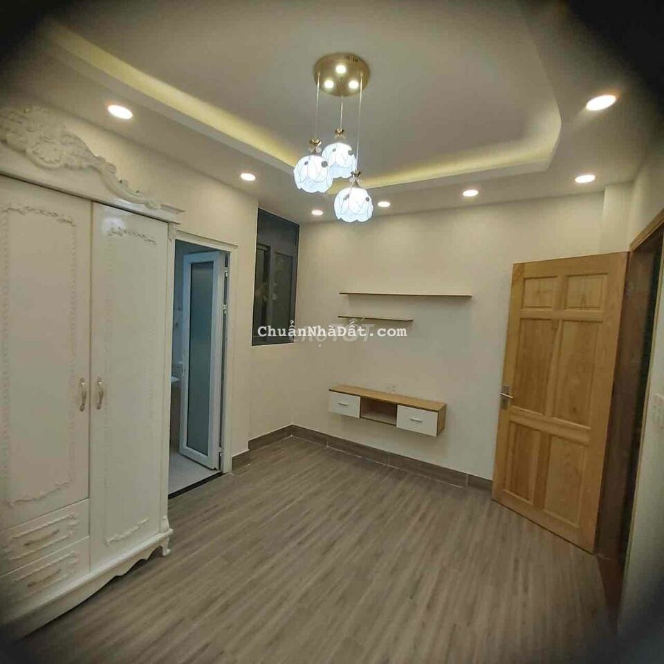 Bán nhà mới 4x13 hẻm XH thông, trệt, lửng 2 lầu, sân thượng