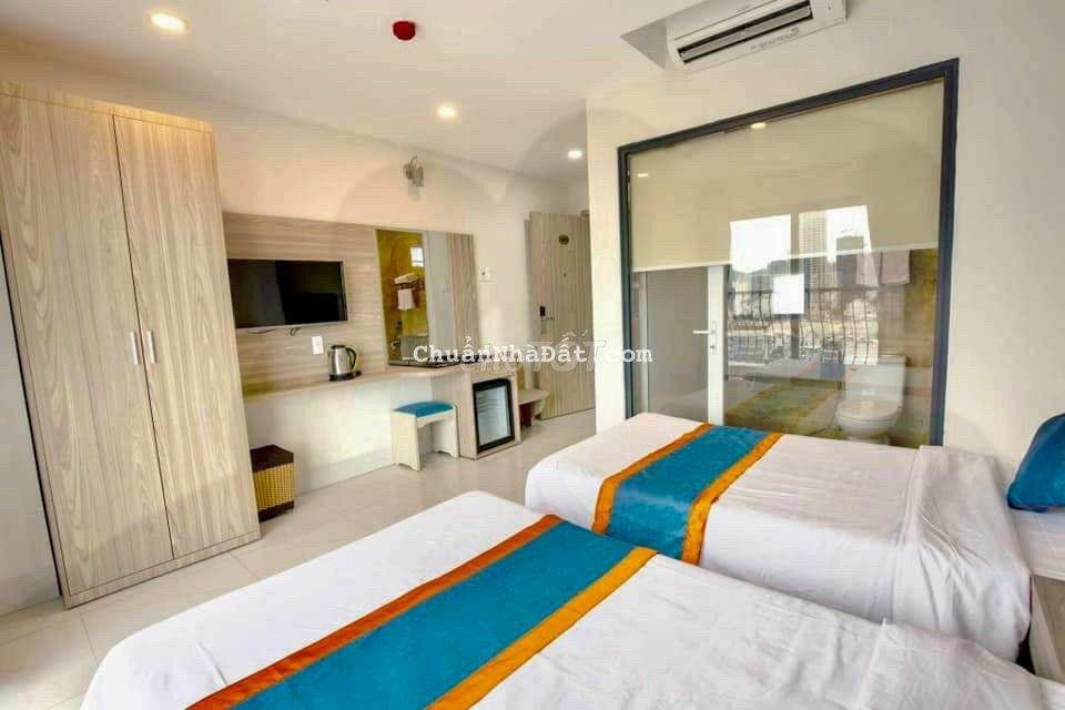 Toà khách sạn 3 sao 65 phòng gần biển &chợ Đầm NT Toà khách sạn 3 sao 65 phòng gần biển &chợ Đầm NT