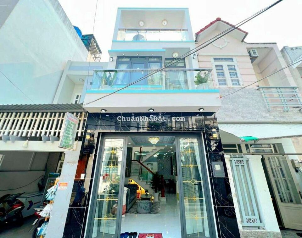 Nhà sổ hồng hẻm xe hơi ,sát bên quận 7