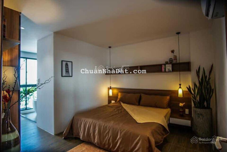 Cần bán CHDV Quận 2. DT: 407m2 gồm : 29 CHDV+4 penhouse. KT: 400tr/th . KC: H 5L, TM Giá : 60ty