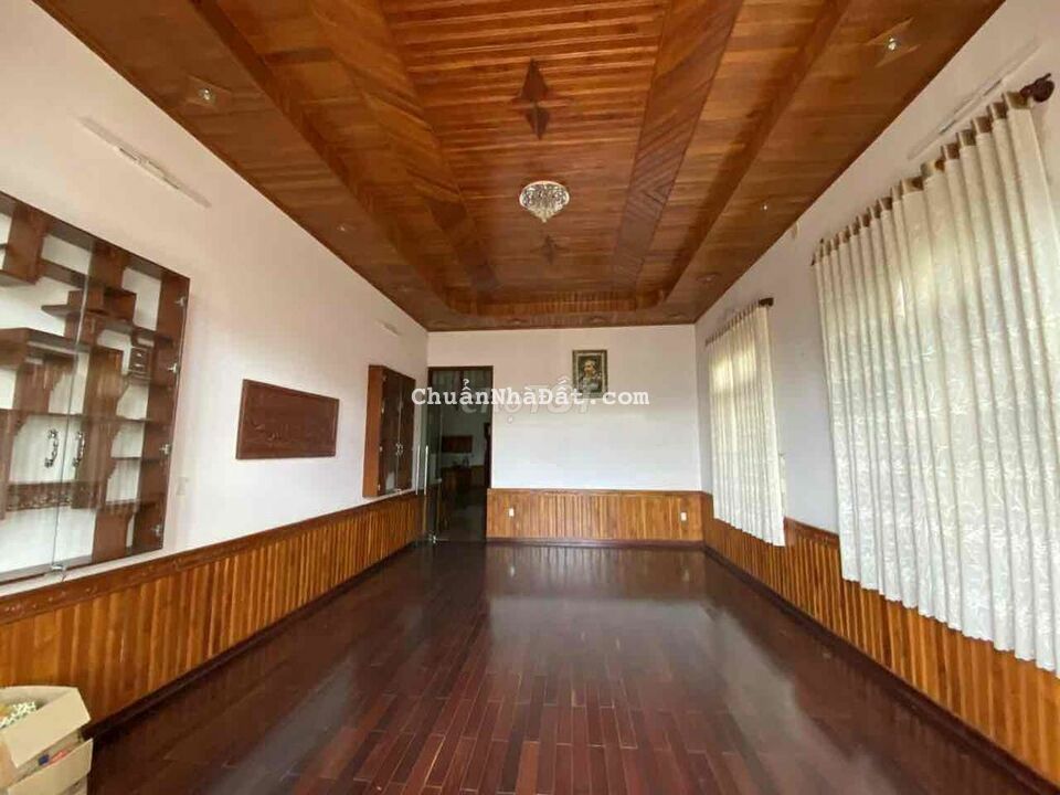 Bán 1253m2 đất Thị Trấn Tân Phú, có biệt thự gỗ mặ