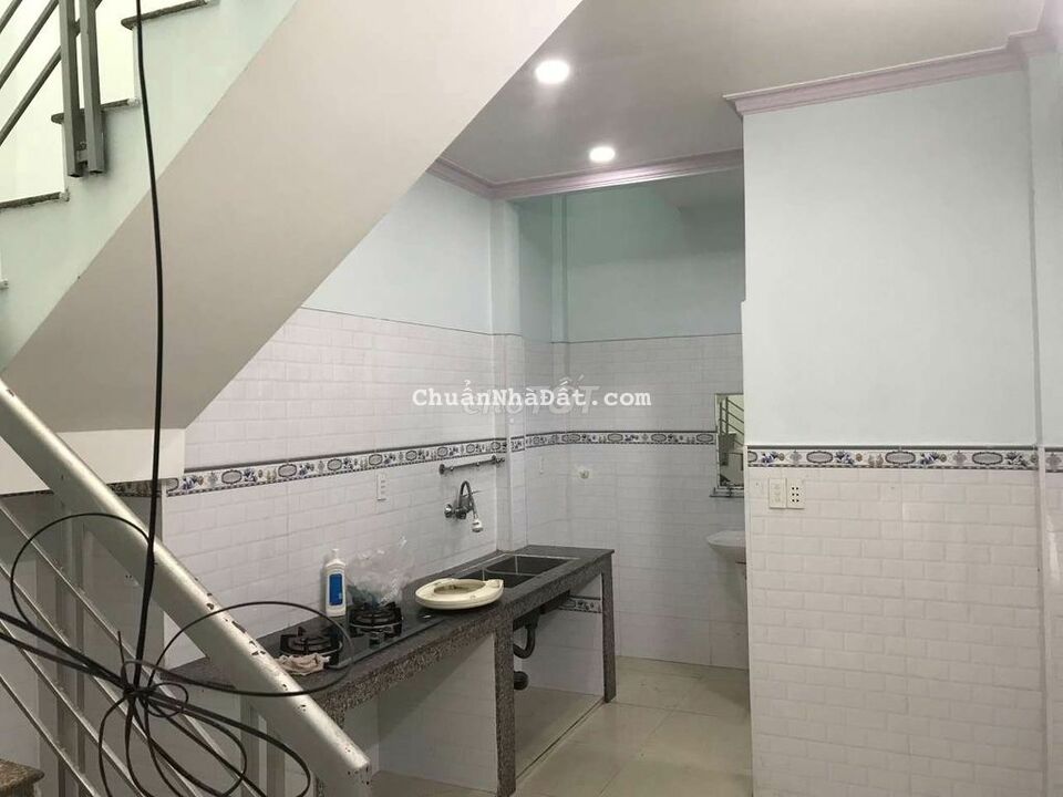 Nhà mặt tiền đg nhựa 15m 1T1L sạch đẹp 3,5*20m 4pn đg Hà Đặc Q12