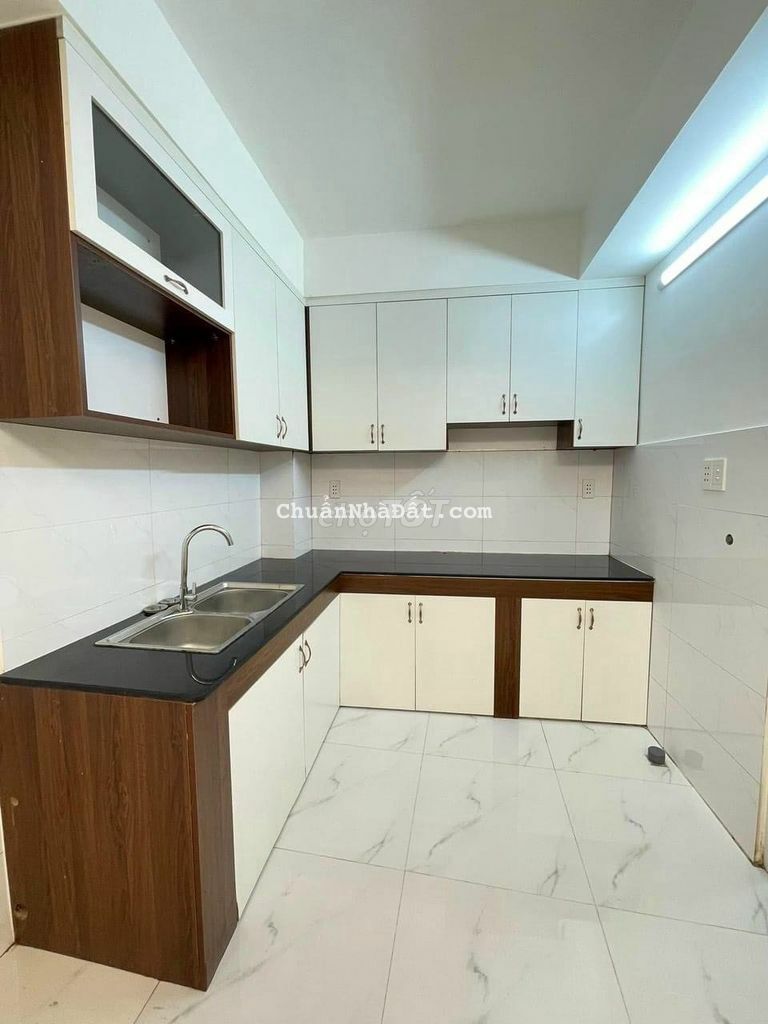 Nhà trệt lầu 2pn, 2wc hẻm gần cầu Tân Thuận 2