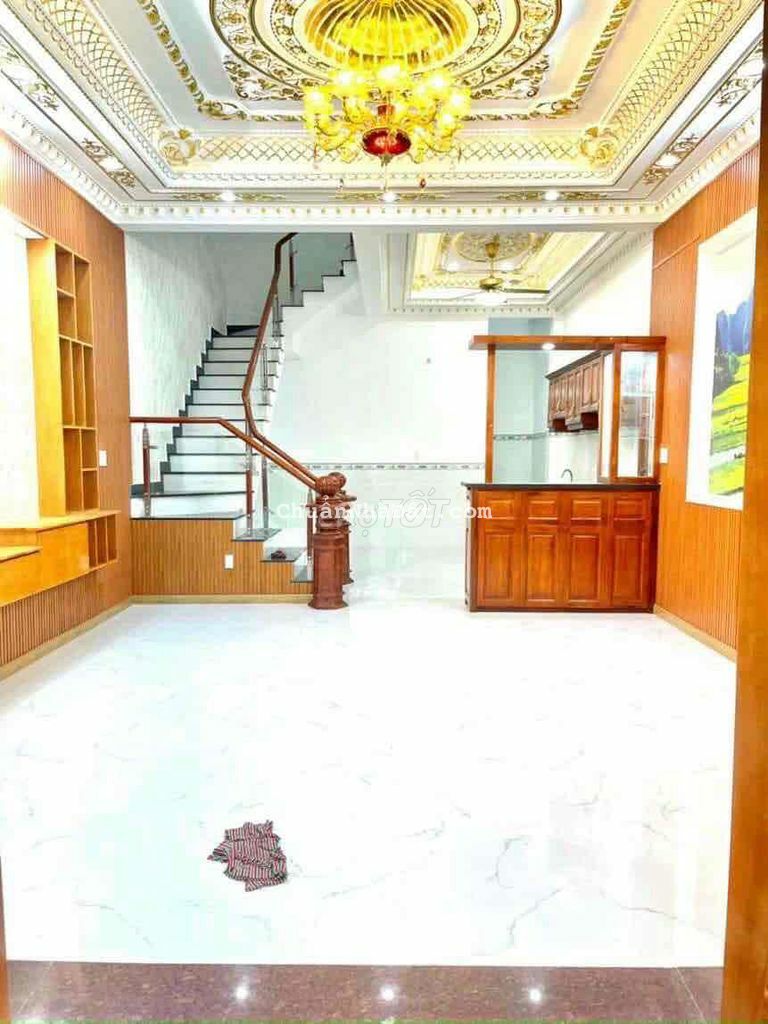 nhà 1 trệt 2 lầu sân xe hơi 4 chỗ, 4p ngủ đường 7m thông 10tr/th