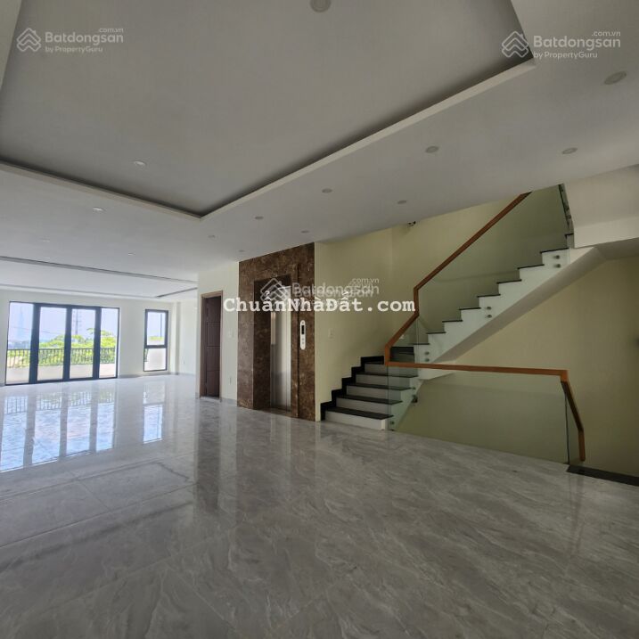 Cho thuê nhà Hào Nam - Đê La Thành 80m2x7T ô tô để trong nhà có hầm, thang máy thiết kế thông sàn